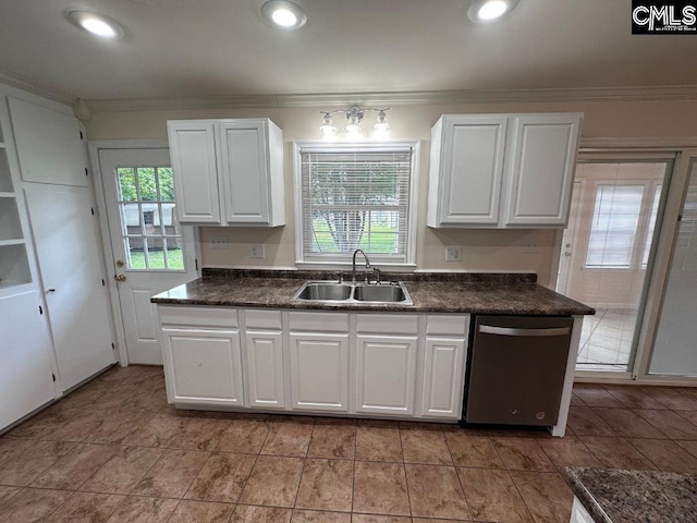 kitchen with sink, white cabinetry, stainless steel dishwasher, and light tile floors