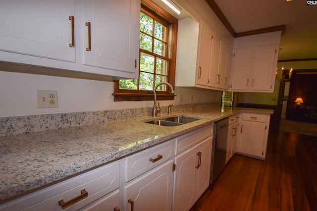 kitchen with dark wood-type flooring, sink, white cabinetry, light stone counters, and stainless steel dishwasher