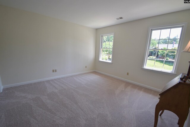 view of carpeted spare room