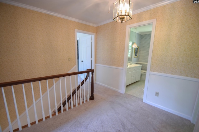 interior space with crown molding and a chandelier