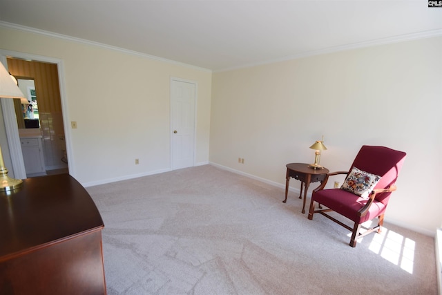 living area featuring ornamental molding and light carpet