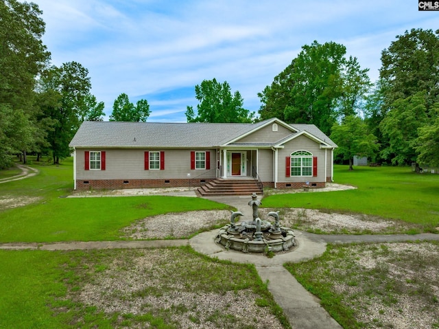 single story home featuring a front yard