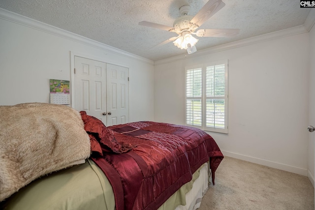 carpeted bedroom featuring crown molding, a textured ceiling, and ceiling fan