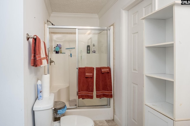 bathroom featuring crown molding, walk in shower, a textured ceiling, tile floors, and toilet