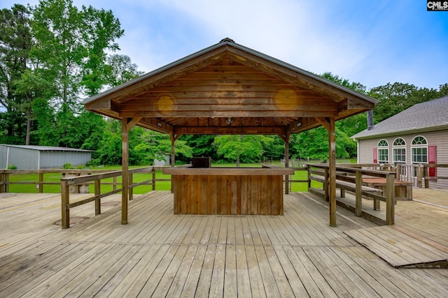 wooden terrace with a gazebo