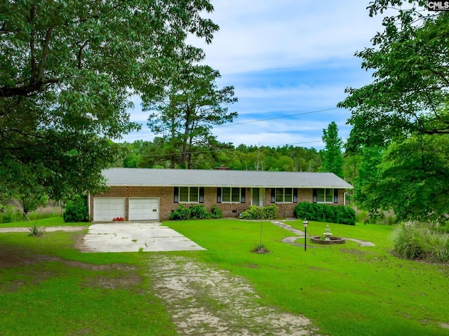 ranch-style home featuring a garage and a front yard