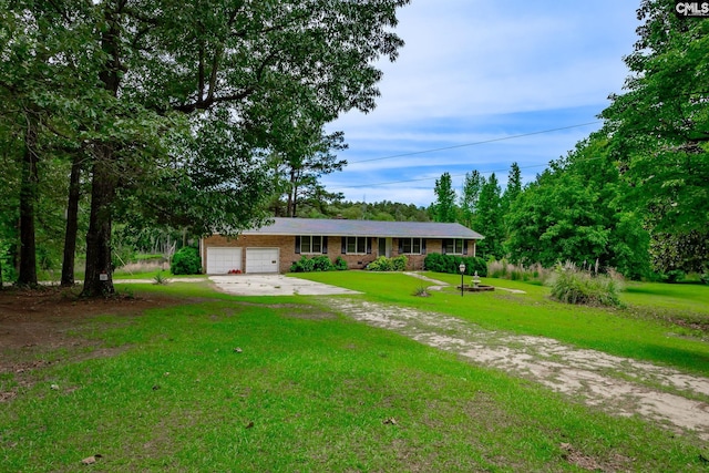 ranch-style home featuring a front yard