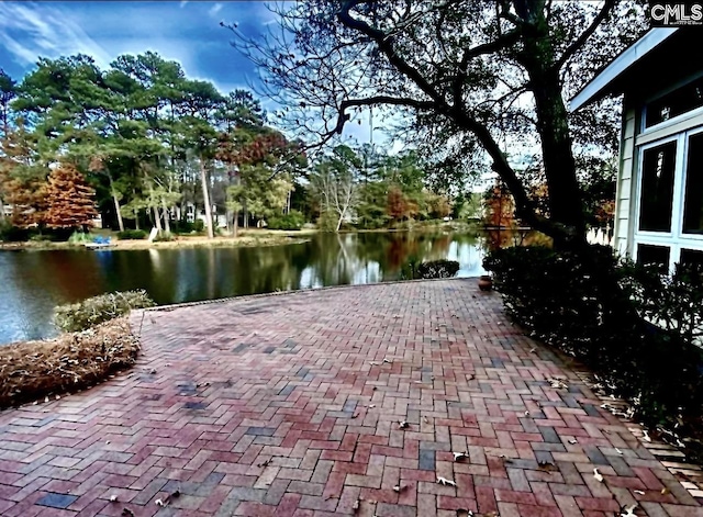 exterior space with a water view