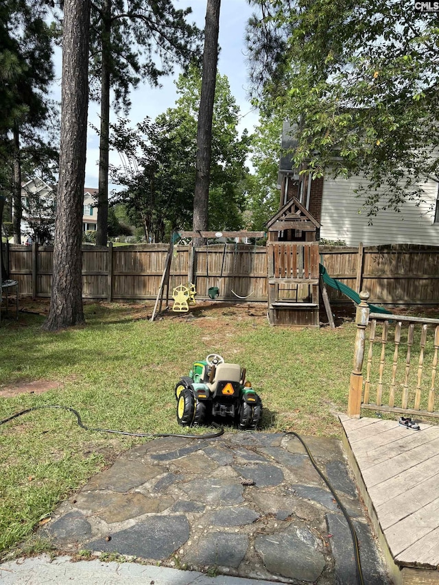 view of yard with a playground