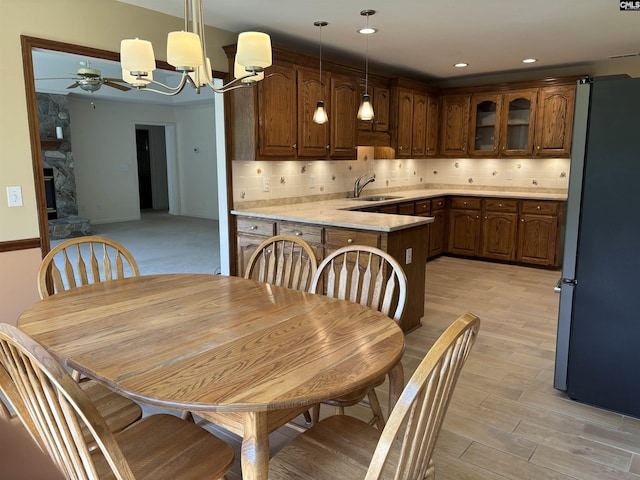 125 Milmont Shores Rd, Chapin, SC 29036 - dining area with a chandelier, ceiling fan, light wood-type flooring, and recessed lighting