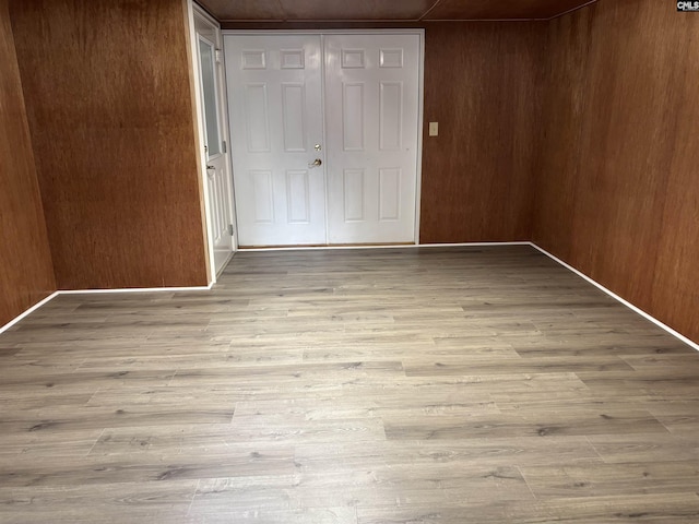 125 Milmont Shores Rd, Chapin, SC 29036 - spare room featuring wood finished floors and wood walls