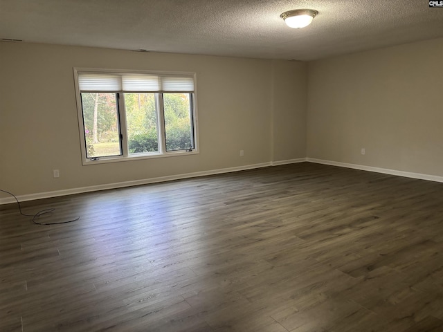 125 Milmont Shores Rd, Chapin, SC 29036 - spare room with dark wood-style floors, baseboards, and a textured ceiling