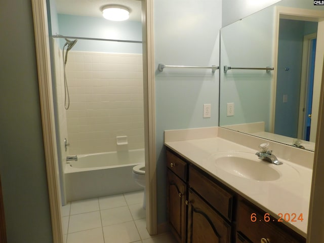 full bathroom featuring tile patterned flooring, vanity, toilet, and shower / washtub combination