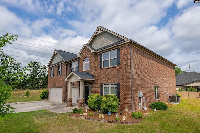 view of front facade featuring a front yard, a garage, and central air condition unit