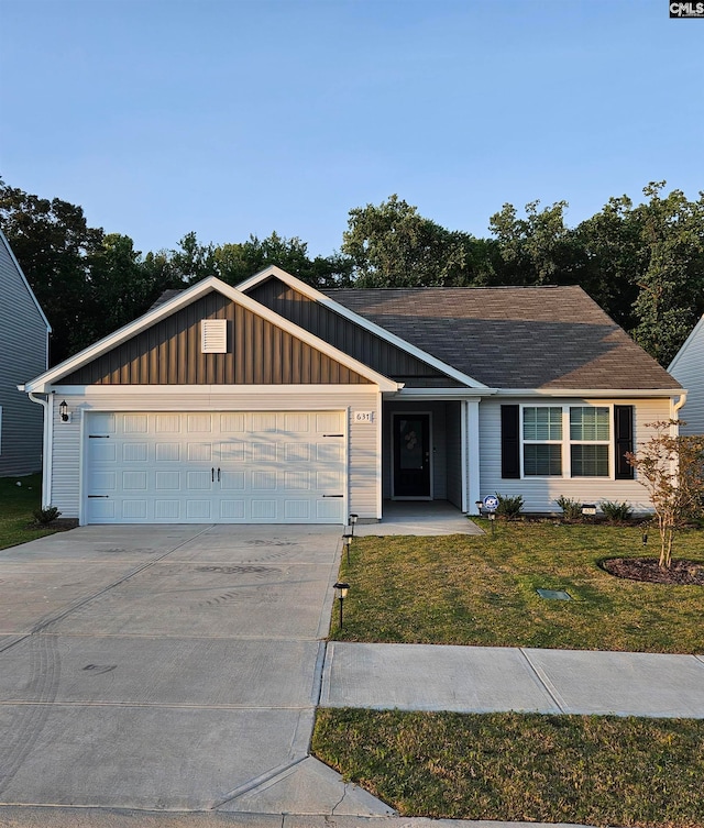 single story home with a front lawn and a garage