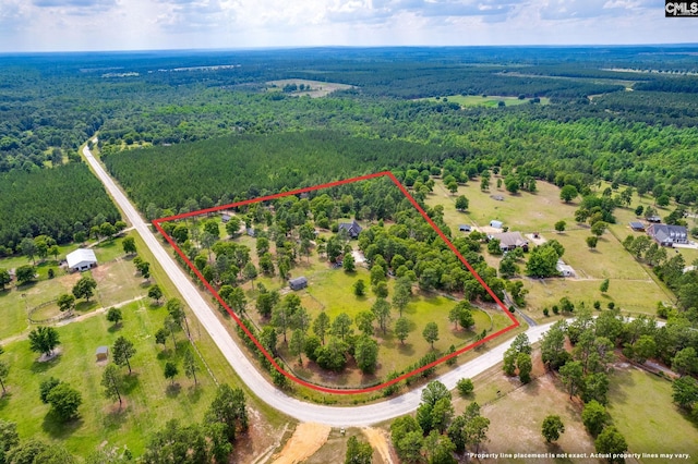 bird's eye view featuring a view of trees