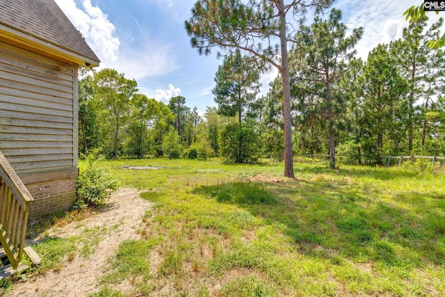 view of yard with fence