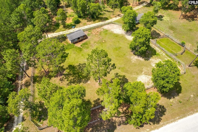 birds eye view of property with a rural view