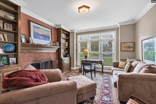 living room featuring a healthy amount of sunlight, hardwood / wood-style flooring, a fireplace, and crown molding