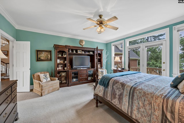 carpeted bedroom featuring crown molding, french doors, ceiling fan, and access to exterior