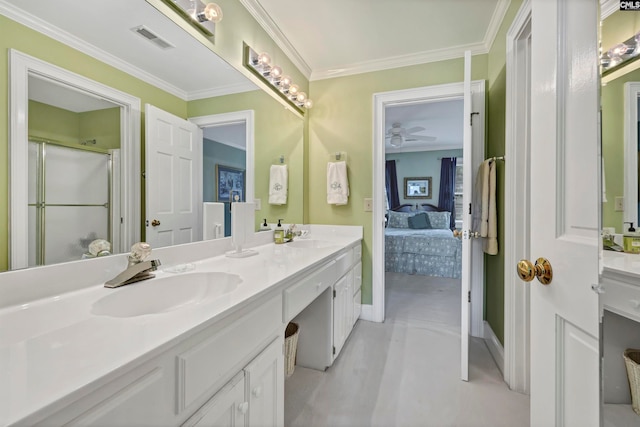 bathroom with dual bowl vanity, ornamental molding, and ceiling fan