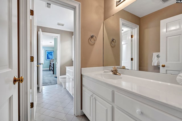 bathroom featuring oversized vanity, toilet, and tile floors