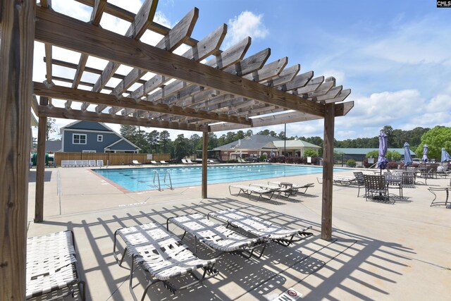 view of pool featuring a pergola and a patio area