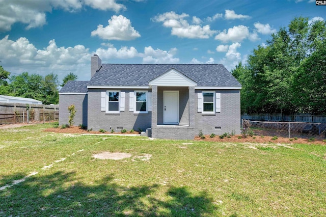 view of front facade with a front yard