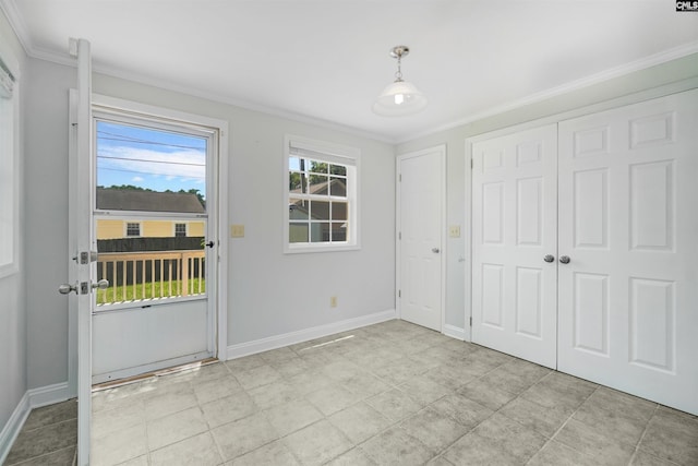 entryway with crown molding