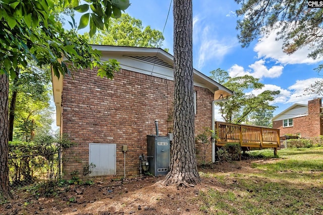 view of home's exterior featuring a deck