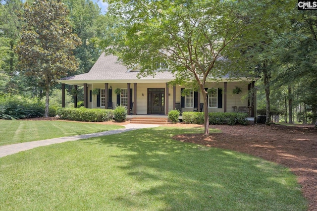 view of front of home featuring covered porch and a front yard