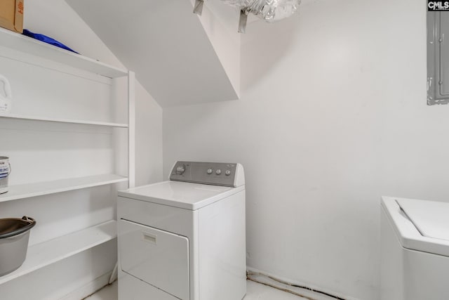 laundry room featuring electric panel and washer and dryer