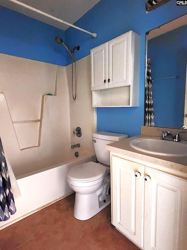 full bathroom with vanity, toilet, and shower / tub combo