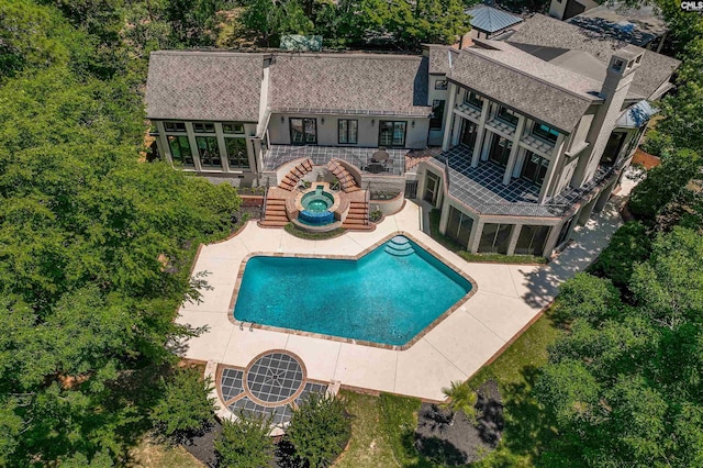 view of swimming pool featuring a patio