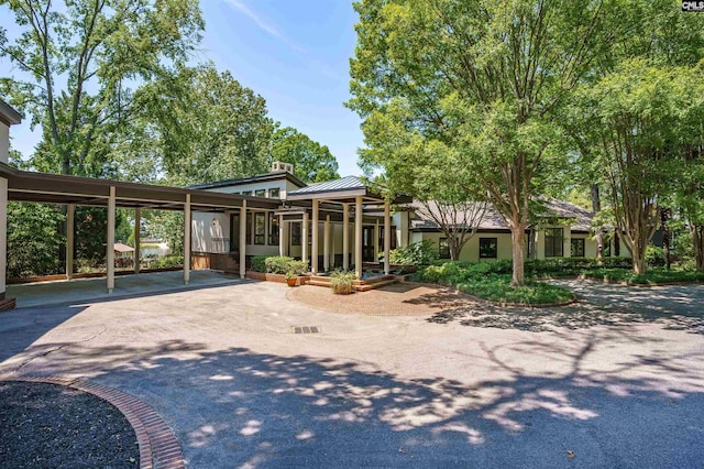 view of front of home with a carport