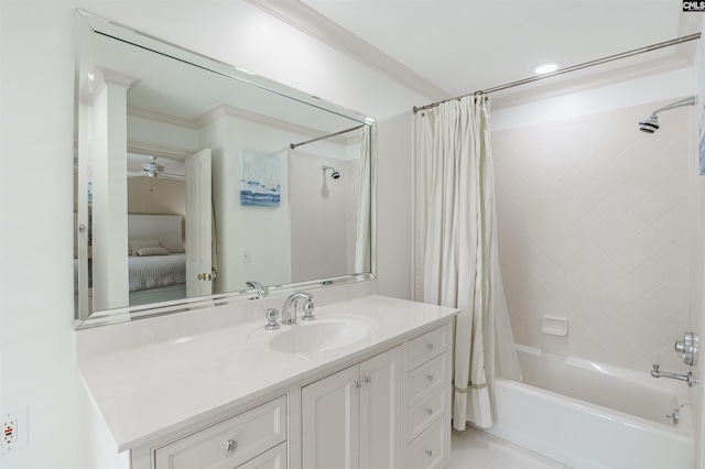 bathroom featuring tile patterned floors, crown molding, vanity, and shower / tub combo with curtain