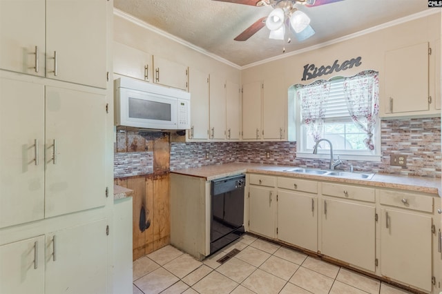 kitchen featuring black dishwasher, decorative backsplash, white microwave, ornamental molding, and a sink