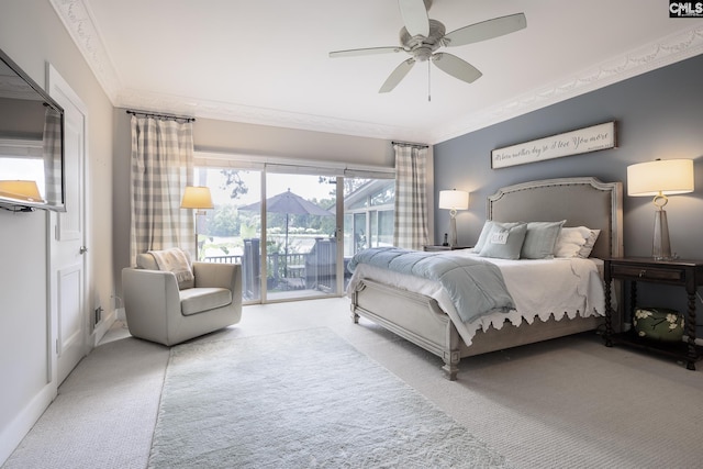 carpeted bedroom featuring access to outside, ceiling fan, and ornamental molding