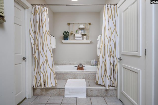 bathroom featuring tile patterned floors and separate shower and tub