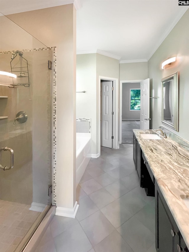 bathroom featuring tile patterned flooring, crown molding, independent shower and bath, and vanity