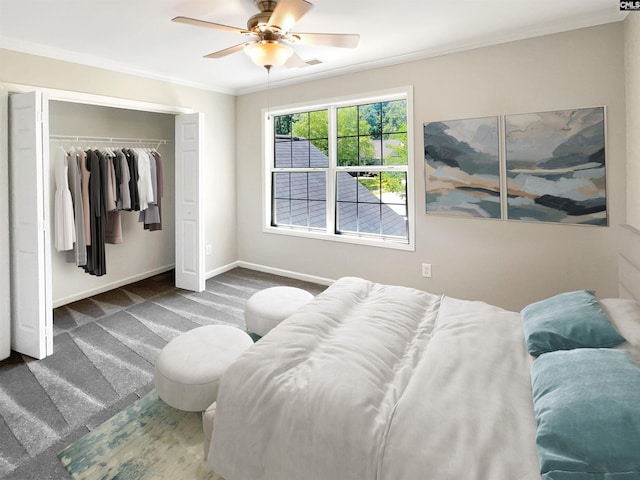 carpeted bedroom featuring ceiling fan, a closet, and crown molding