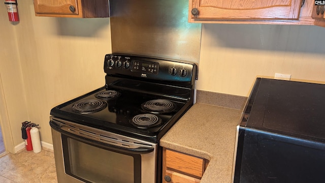 kitchen featuring stainless steel electric stove