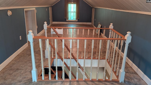 stairs with lofted ceiling and baseboards