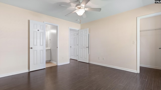 unfurnished bedroom featuring dark hardwood / wood-style flooring, a closet, and ceiling fan