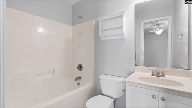 full bathroom featuring vanity,  shower combination, toilet, and ceiling fan