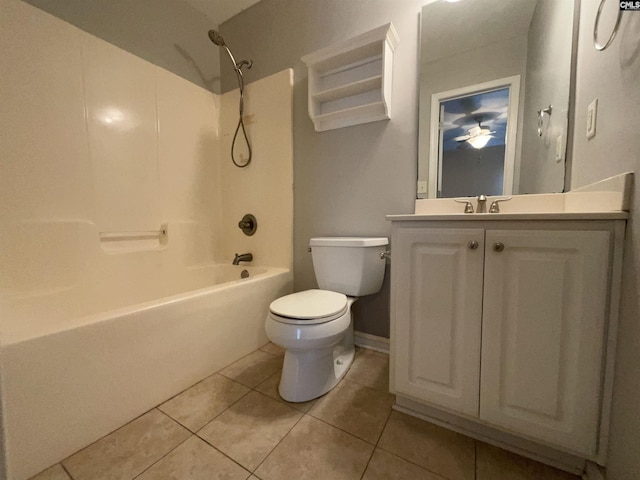 full bathroom with tile patterned flooring, shower / bathing tub combination, vanity, and toilet