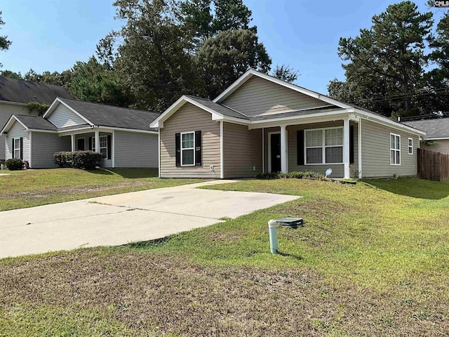 ranch-style house with a front yard