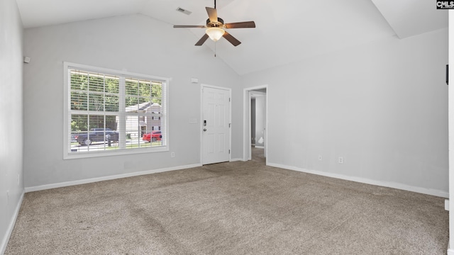 carpeted spare room with high vaulted ceiling and ceiling fan