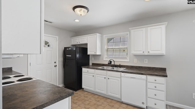 kitchen featuring white cabinets, white appliances, and sink