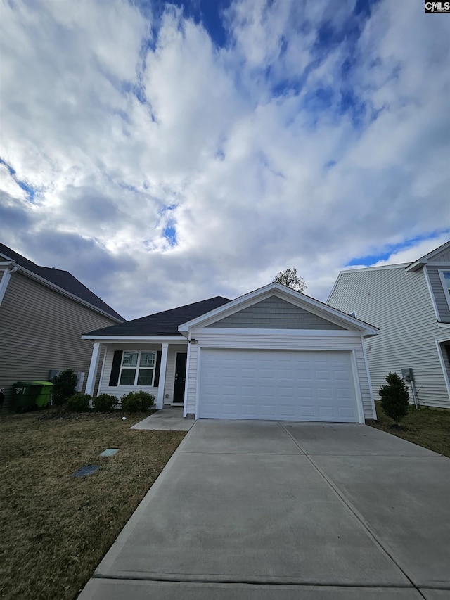 single story home featuring a garage